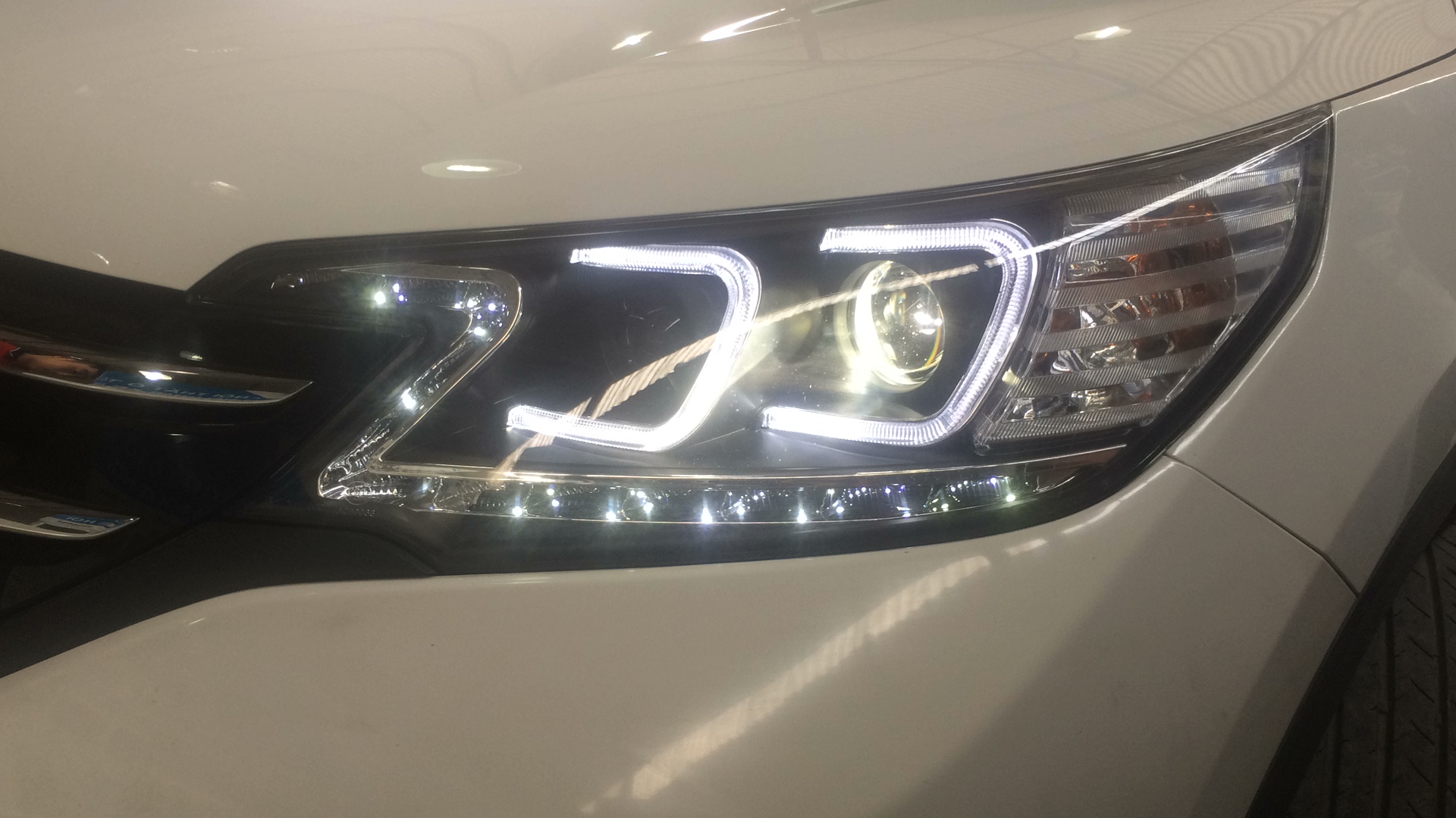 Honda CRV 2014 thay đèn nguyên bộ